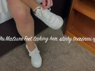Mrs Mature Feet removes her trainers