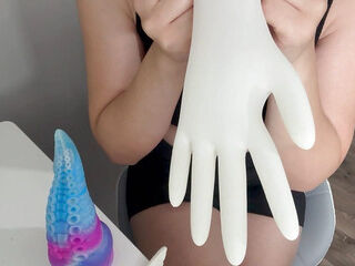 Doctor in white gloves masturbating my monster cock with oil