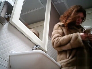Women pee in public toilet 2273
